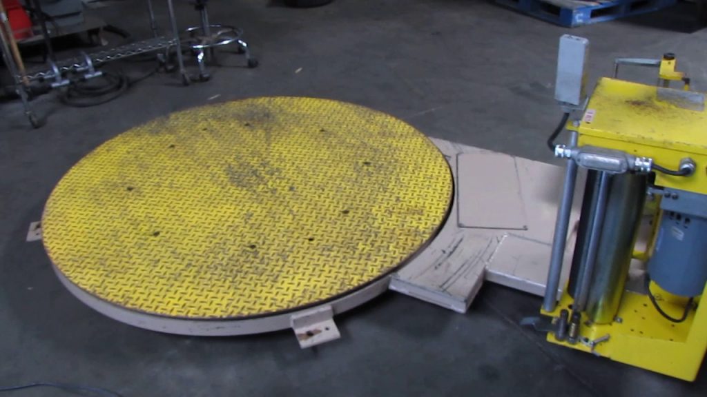 “Efficient Pallet Wrapping Solution with Low-Profile Stretch Wrapper”