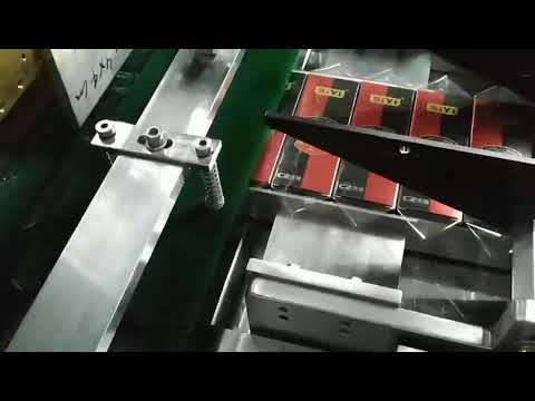 “Efficient 3D Wrapping and Sealing Machine for Coffee and Milk Capsules in Carton Boxes”