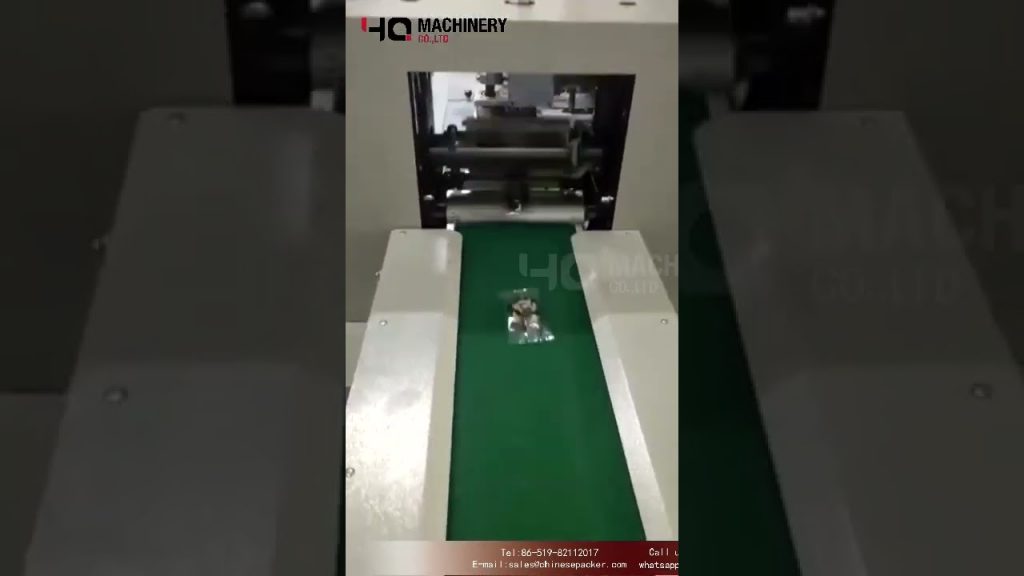 Efficient Automatic Flow Wrapping Solution for Cereal Chocolate Bars by YQ Machinery Efficient Automatic Flow Wrapping Solution for Cereal Chocolate Bars by YQ Machinery