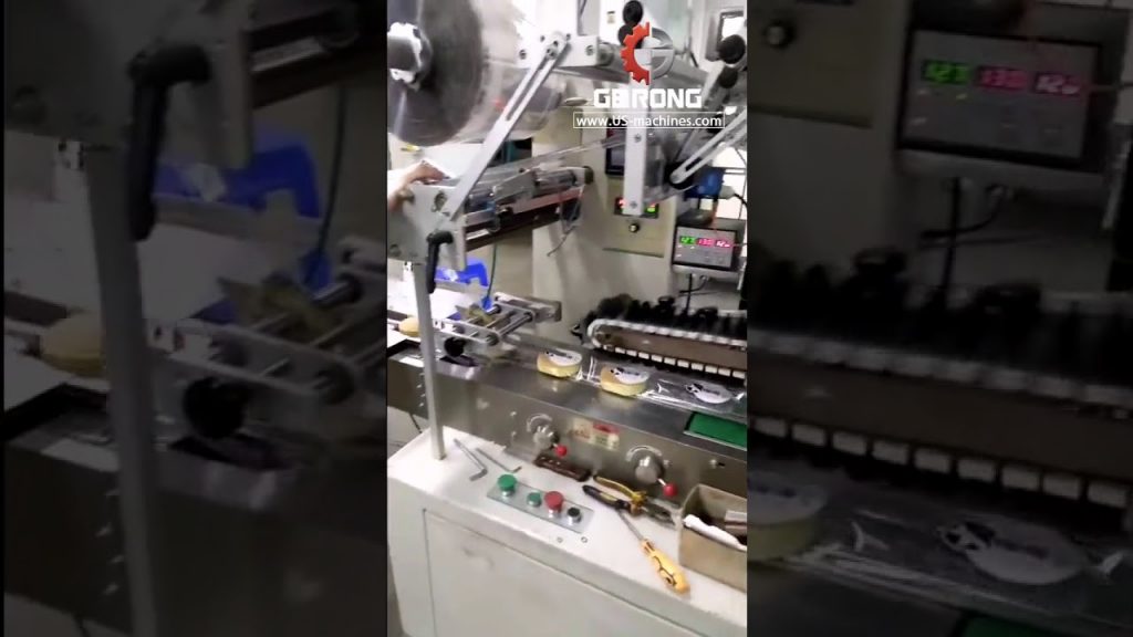 Efficient Cake Wrapping and Sealing Machine with Automatic Horizontal Feeding Efficient Cake Wrapping and Sealing Machine with Automatic Horizontal Feeding