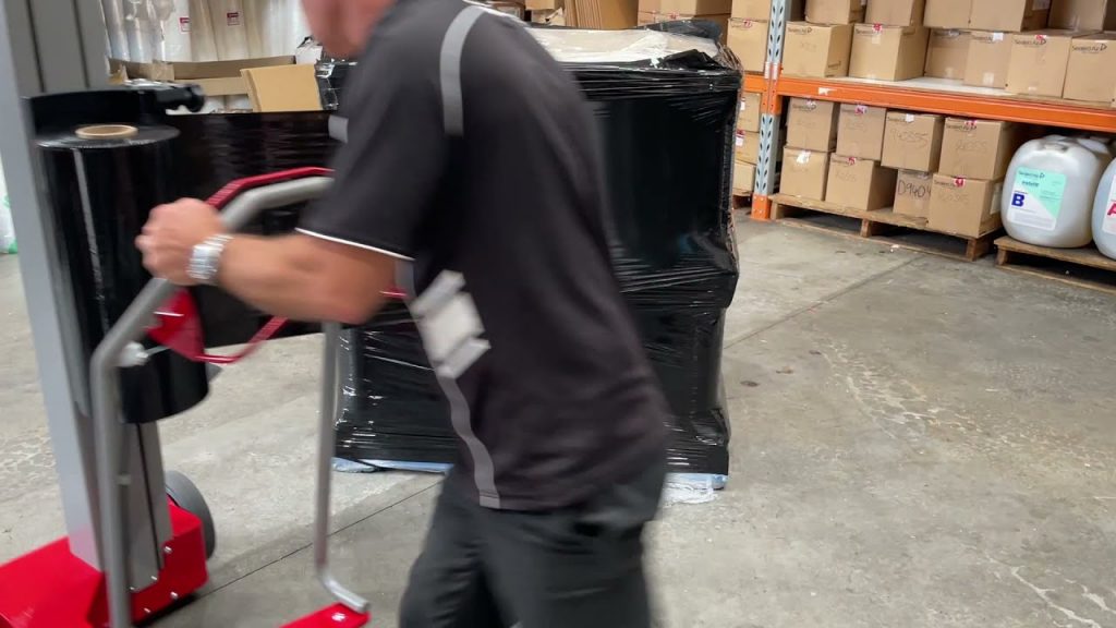 “Efficient Mobile Pallet Wrapper with Black Stretch Film for PackIT Manual Wrapping Needs”
