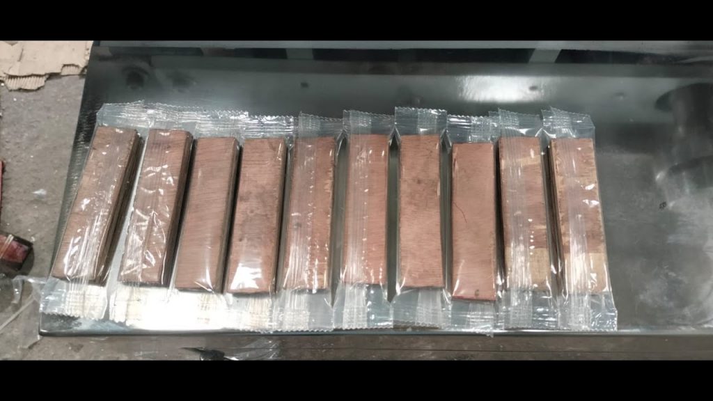 “Efficient Packing Solutions: Horizontal Flow Wrapping Machine for Mango Bars – Standard Pack 93810/25505”