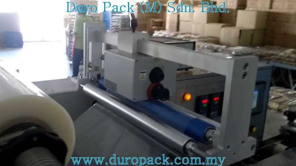 “Efficient and Precise Horizontal Wrapping Machine for Freshly Baked Butter Cakes”