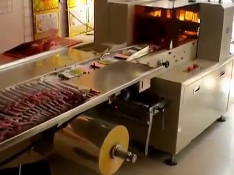 “Efficient and Reliable Horizontal Flow Wrapper for Automatic Hardware Packing and Wrapping”