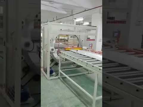 “Efficient and Versatile Horizontal Stretch Wrapping Machine for Pipe and Panel Packaging”