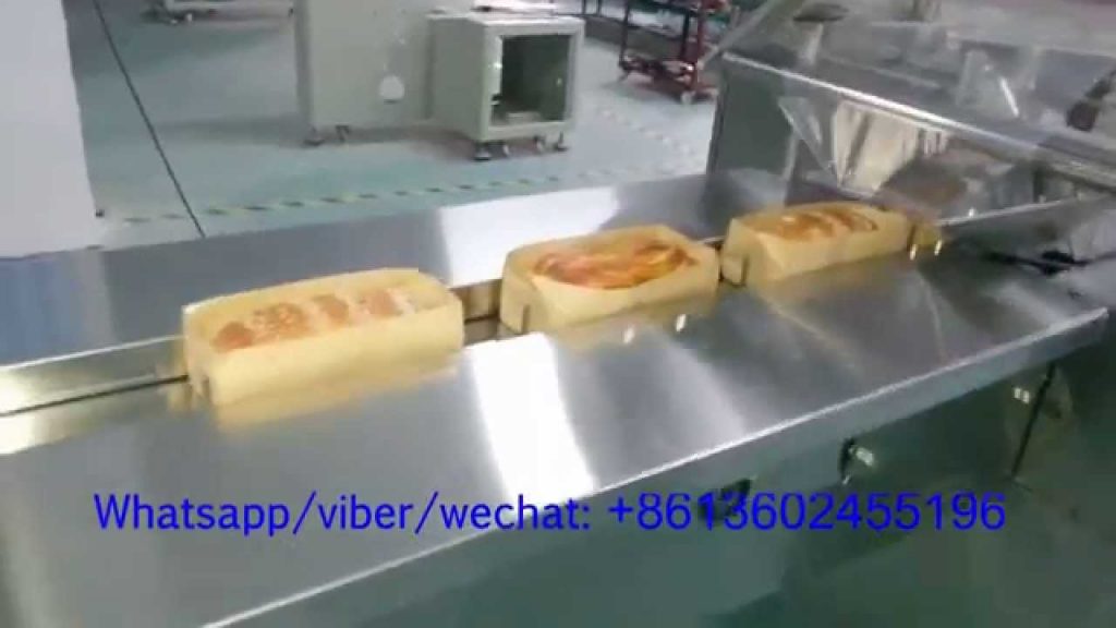 “Effortlessly Wrap Your Breads and Pizzas with a Horizontal Reciprocating Flow Wrapper” “Effortlessly Wrap Your Breads and Pizzas with a Horizontal Reciprocating Flow Wrapper”