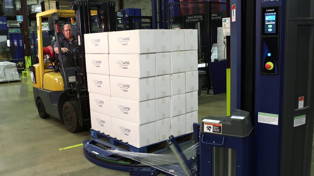 “Effortlessly Wrap and Secure Pallets with the QL400XT Stretch Wrapper Click n Go Remote”