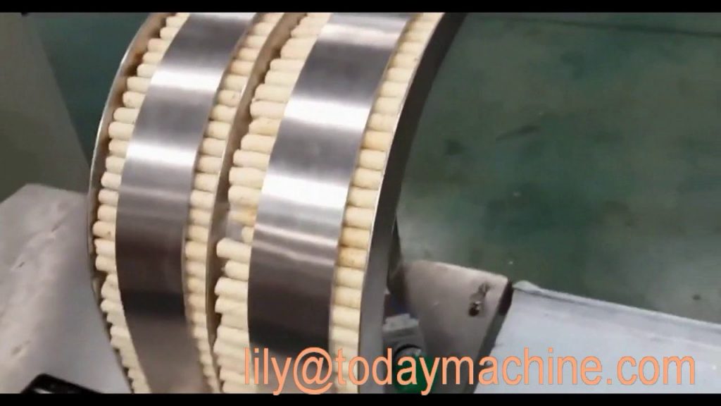 “Perfectly Wrapped Christmas Treats with Horizontal Fondant Cookie and Egg Roll Packaging Machine”