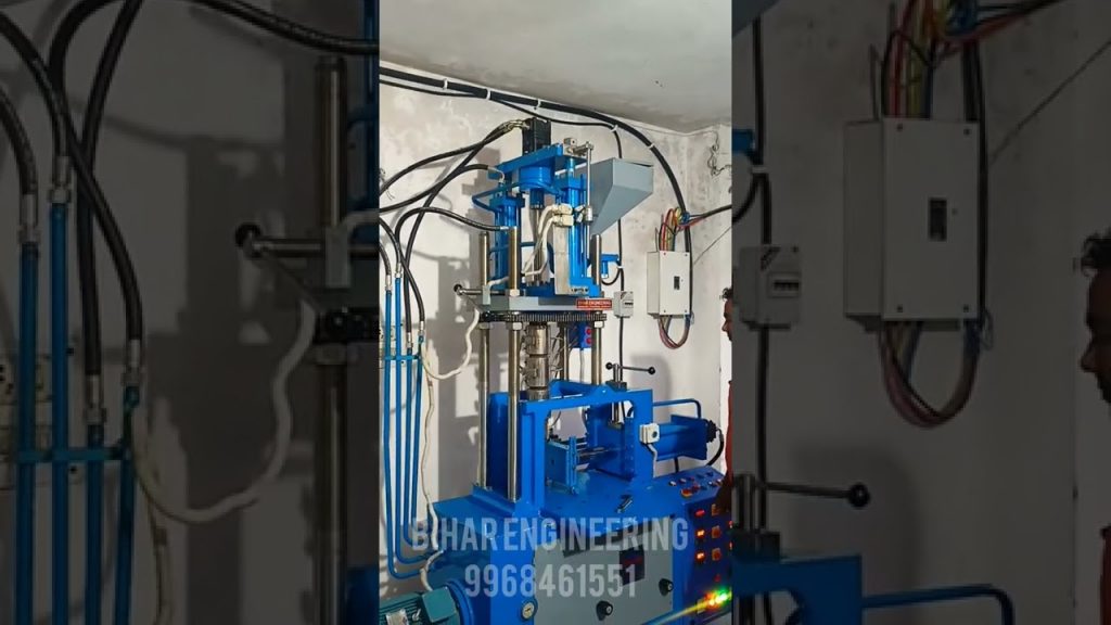 “Efficient Screw-Type Vertical Plastic Molding Machine with 100g Capacity – Aligarh”