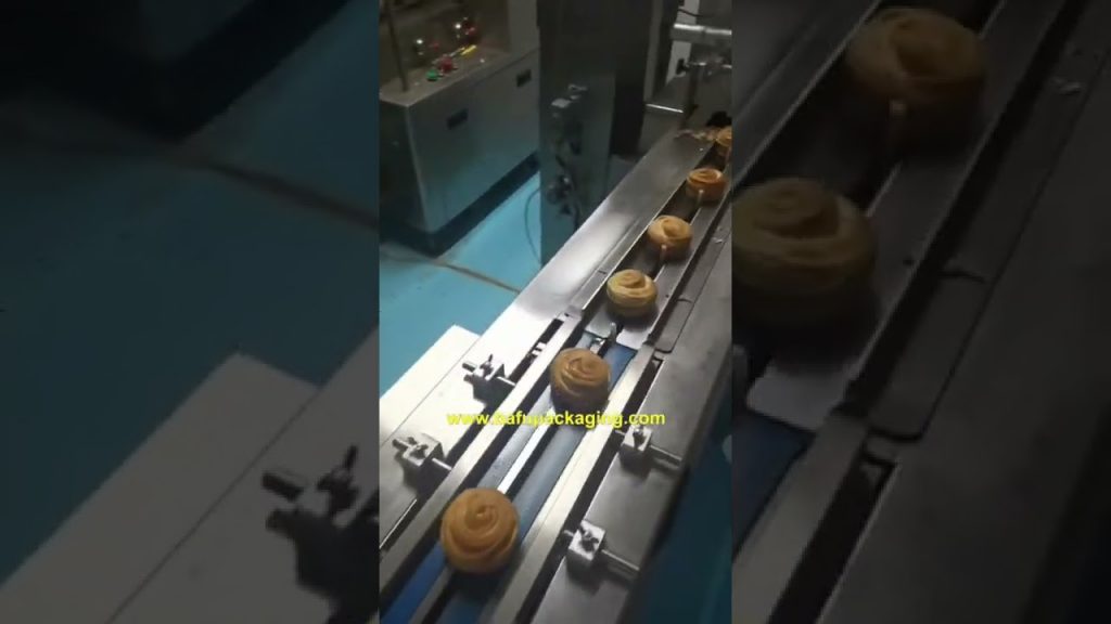 “Revolutionary High-Speed Bread Packaging Machine with Automatic Flow Wrapping Technology” “Revolutionary High-Speed Bread Packaging Machine with Automatic Flow Wrapping Technology”