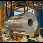 “Innovative Coil Strapping Machine: Enhanced Circumferential & Radial Strapping for Efficient Packaging”